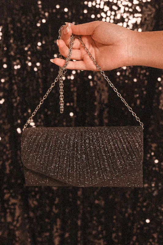- Pet stroller can be taken on the planeAudrina Clutch - Black Sparkle